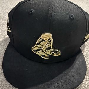Black and gold Boston Red Sox baseball hat